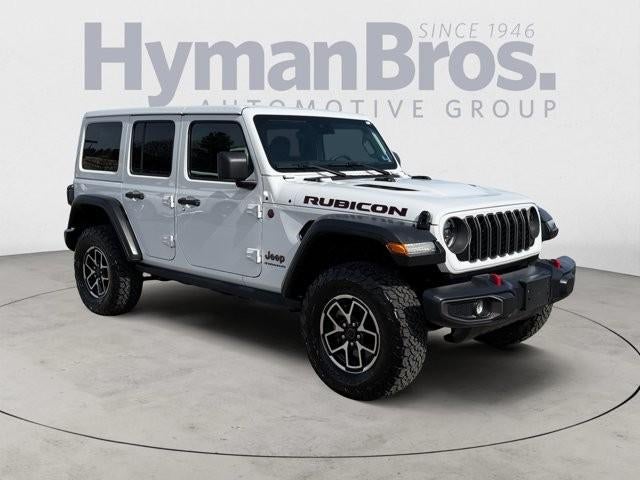 2025 Jeep Wrangler Rubicon 4 Door 4x4 in Bright White Clearcoat — front three-quarter view