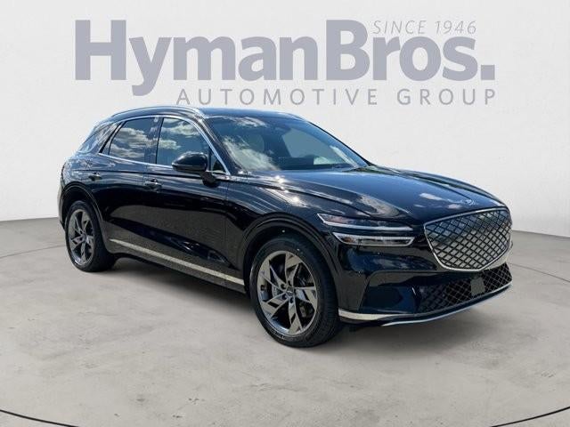 2023 Genesis Electrified GV70 Advanced AWD in Vik Black — front three-quarter view