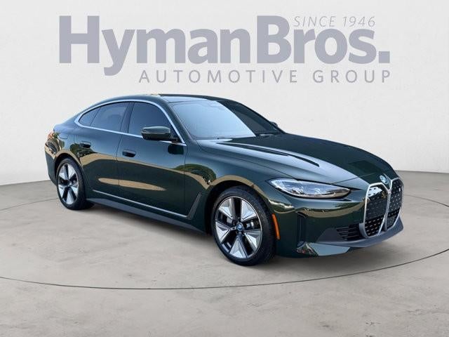 2023 BMW i4 Gran Coupe in San Remo Green Metallic — front three-quarter view