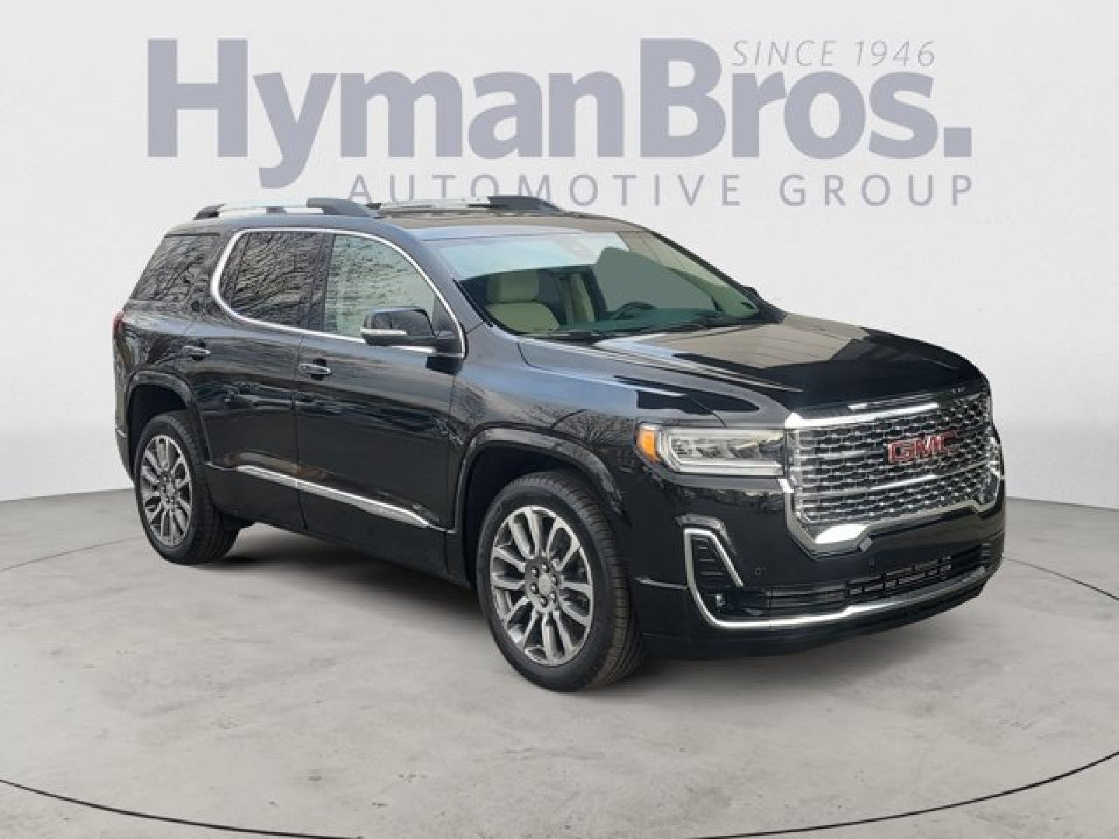 2023 GMC Acadia Denali AWD | Pano in Ebony Twilight Metallic — front three-quarter view