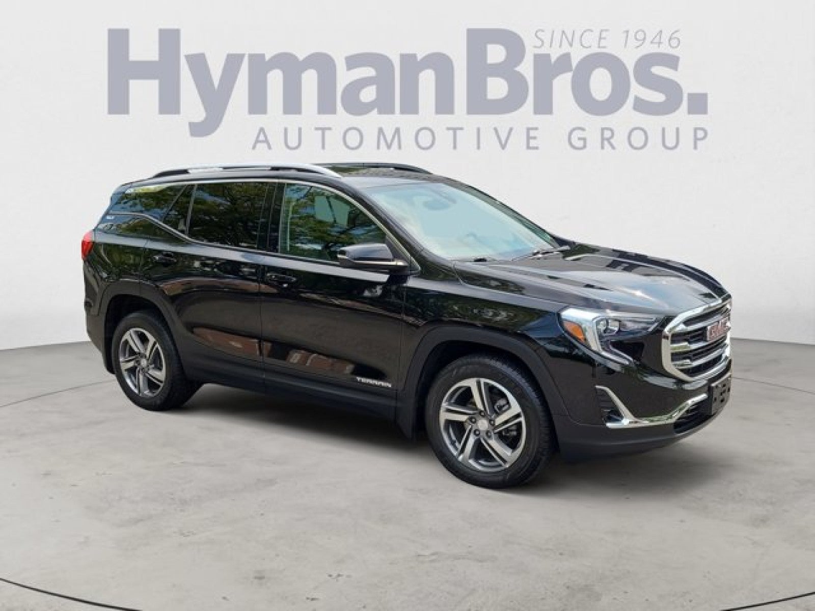 2021 GMC Terrain SLT AWD in Ebony Twilight Metallic — front three-quarter view