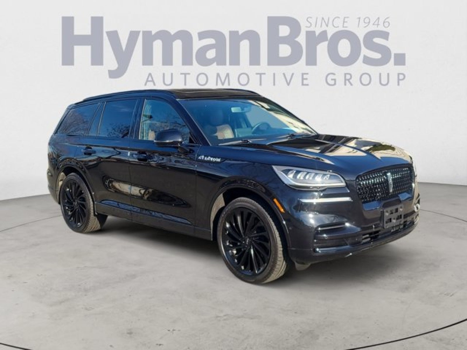 2024 Lincoln Aviator Reserve AWD | Lux/ Jet Packages, $75k msrp in Infinite Black Metallic Clearcoat — front three-quarter view