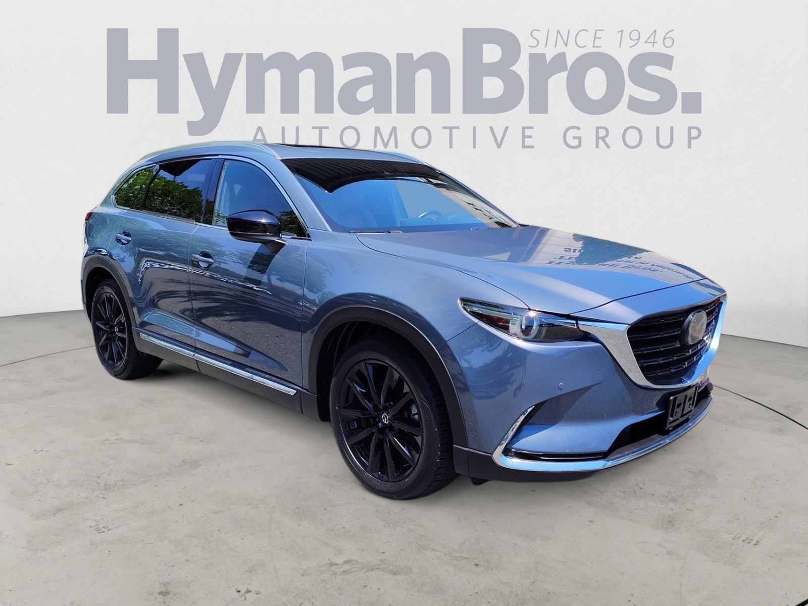2023 Mazda Mazda CX-9 Carbon Edition AWD in Polymetal Gray Metallic — front three-quarter view