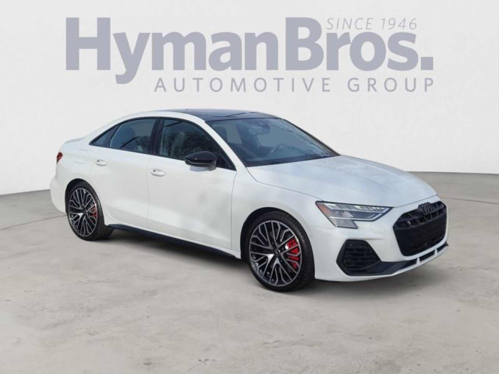 2025 Audi S3 Prestige, Black Optic, S Sport in Arkona White — front three-quarter view